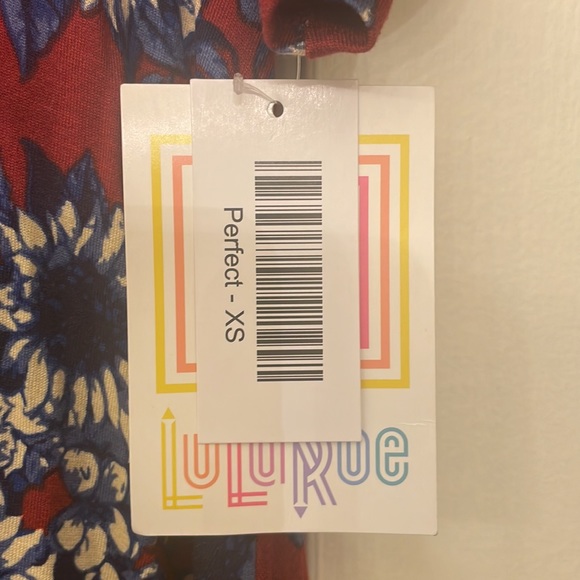 Lularoe xs floral top or dress depending how tall you are. Nwt - Picture 3 of 5